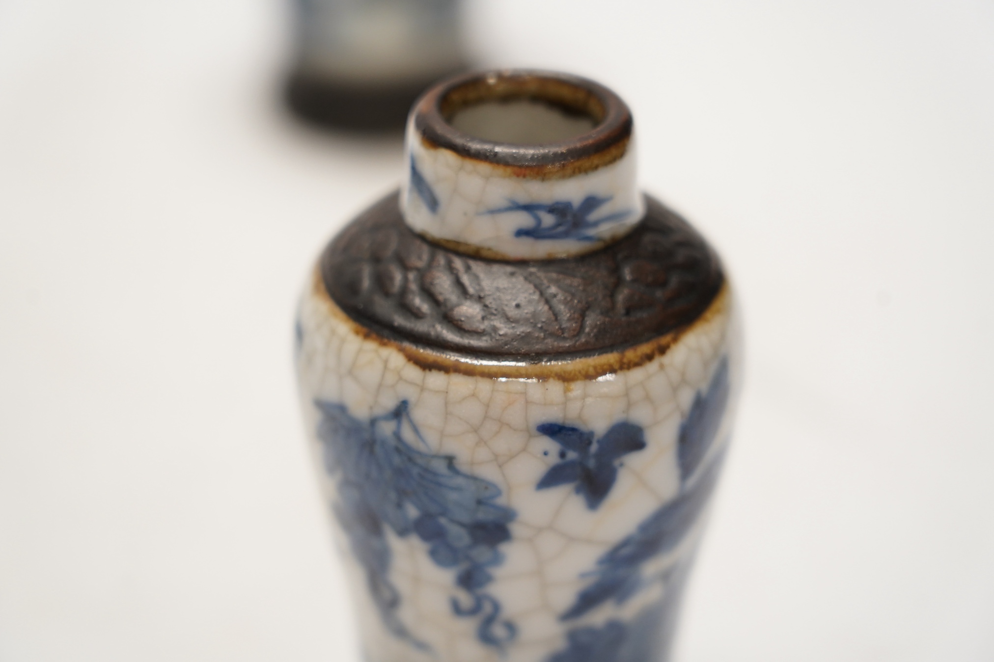 Chinese blue and white ceramics comprising crackle glaze vases and circular seal pots (4). Condition - fair to good, a few minor chips